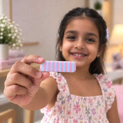 Bubble Mint hair clip by Zootii held in hand: pink and sky blue candy-stripe clip