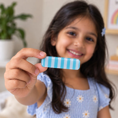 Stripes Blue Pink hair clip by Zootii held in hand: sky blue and white straight-stripe clip
