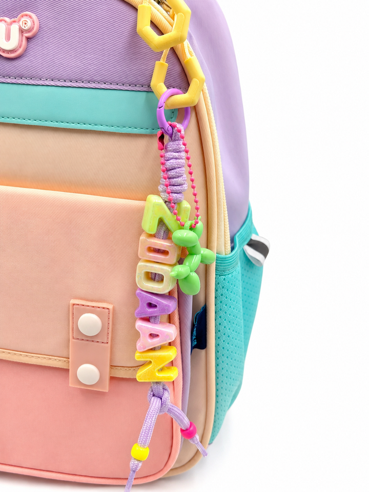 Personalised alphabet bag charm with lucky charm
