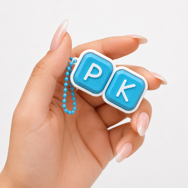 Blue personalised clicker bag charm with custom initials