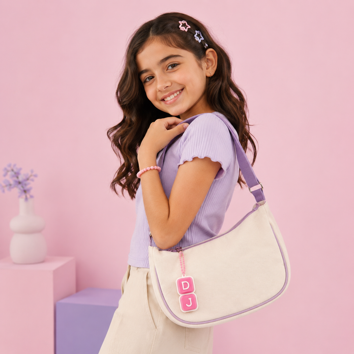 Girl using a personalised clicker bag charm accessory