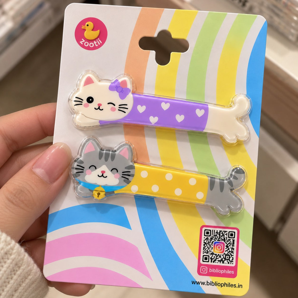 Kittens Love hair clips by Zootii: 2 cat snap clips on the zootii card, held in hand