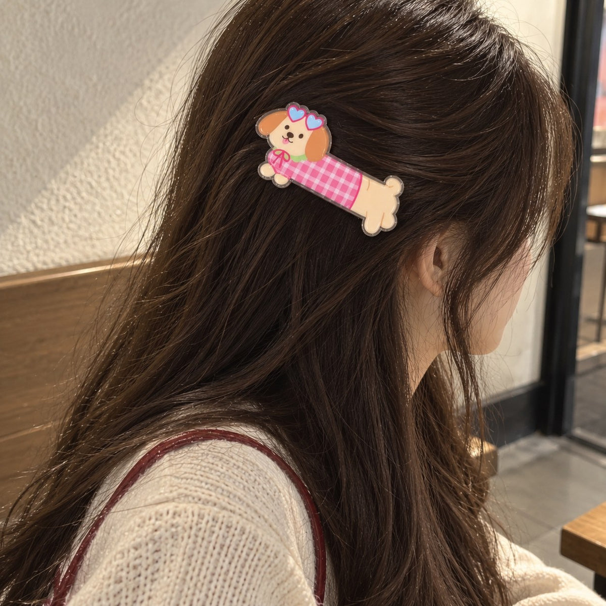Puppies Day dog hair clip worn on a side parting